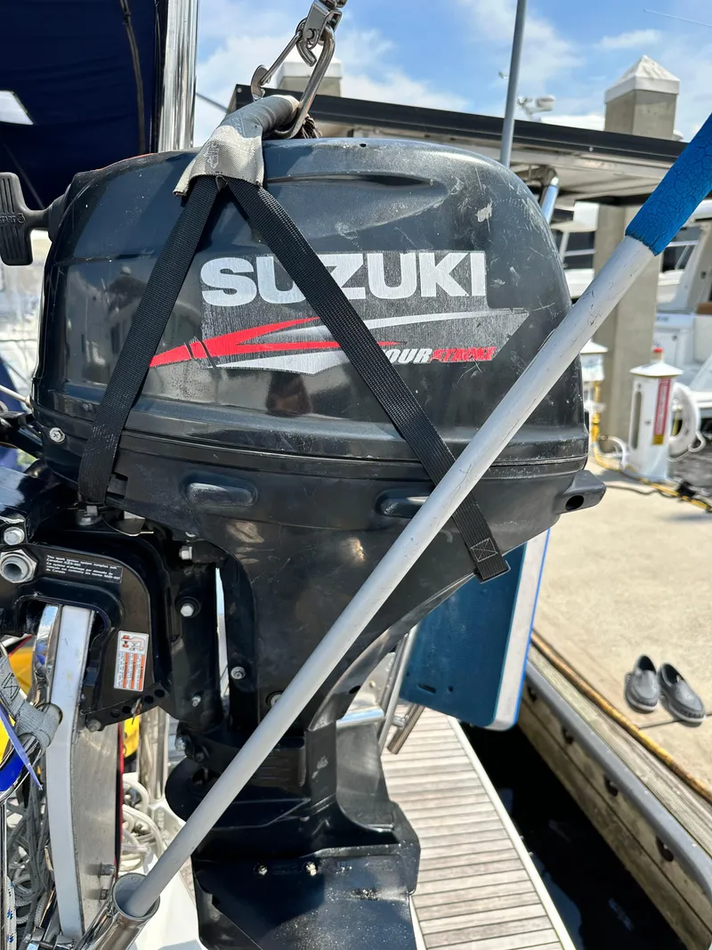 Slide: The Image of Suzuki outboard motor on a 2014 Beneteau Oceanis 45 sailboat at dock. - 24