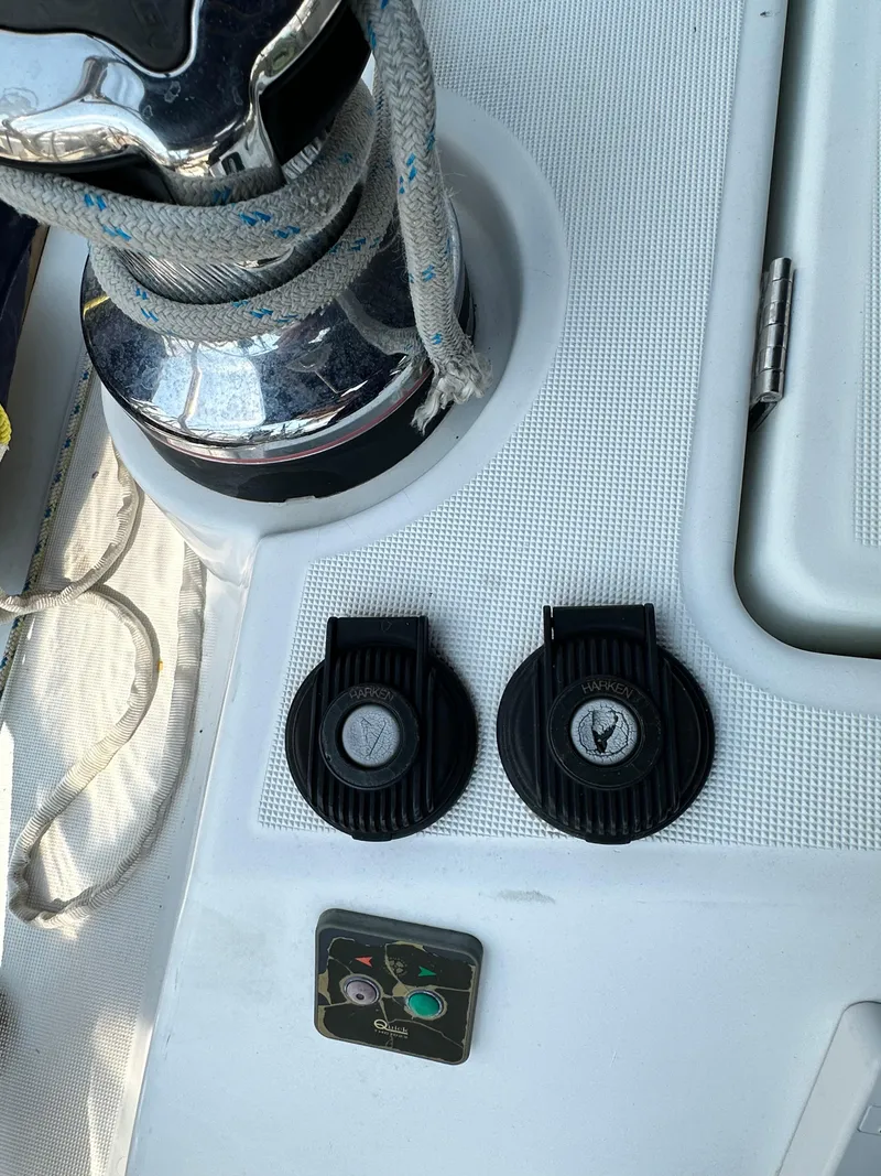 Slide: The Image of Close-up of a 2014 Beneteau Oceanis 45 yacht deck with winch and controls. - 30