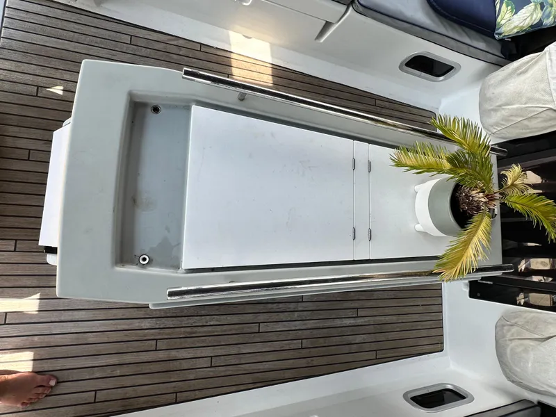 Slide: The Image of Beneteau Oceanis 45 yacht deck with wooden flooring and potted plant, 2014 model. - 36