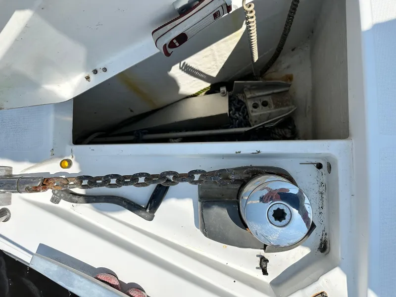 Slide: The Image of Anchor chain and windlass on a 2014 Beneteau Oceanis 45 sailboat deck. - 4
