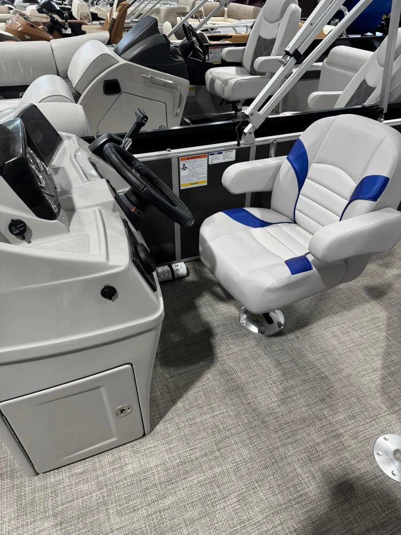 Slide: The Image of 2024 G3 Select 18C boat interior with steering console and cushioned seat. - 10