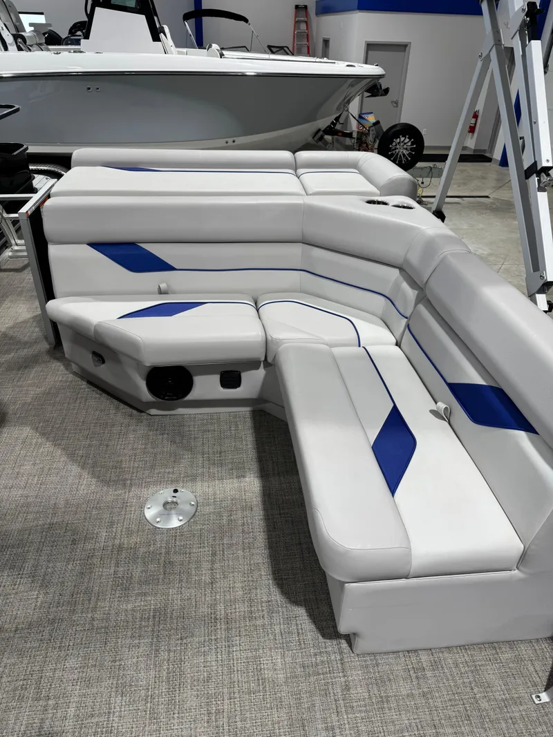 Slide: The Image of 2024 G3 Select 18C boat interior with gray and blue seating. - 11