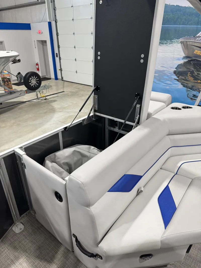 Slide: The Image of 2024 G3 Select 18C boat interior with storage compartment and cushioned seating. - 12