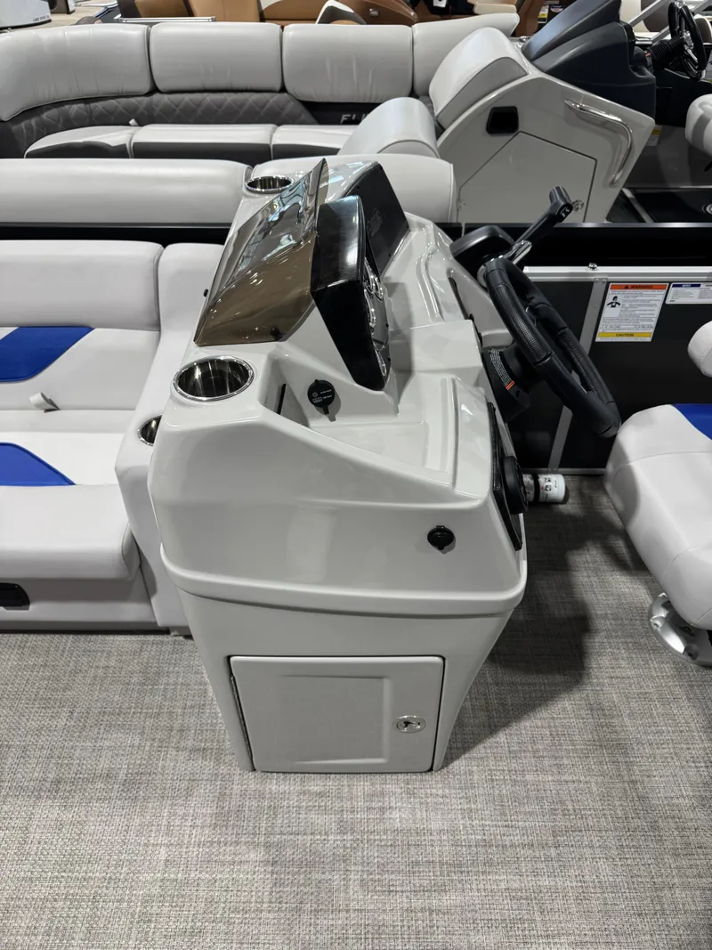 Slide: The Image of 2024 G3 Select 18C boat interior with modern console and seating. - 8