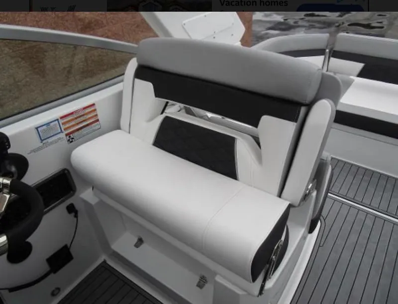Slide: The Image of 2022 Monterey 295 Sport Yacht interior seating with sleek, modern design and comfortable upholstery. - 20