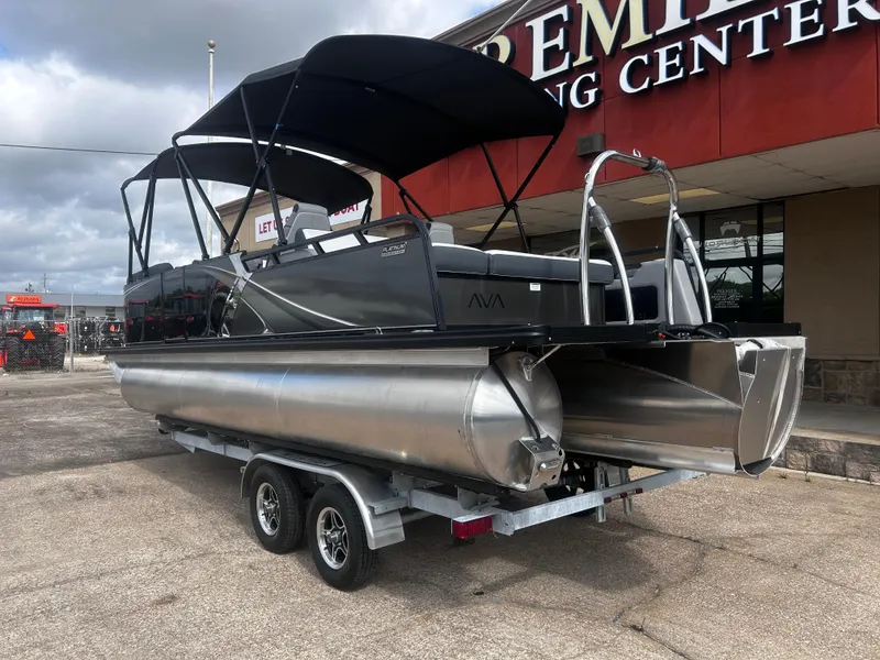 Slide: The Image of 2025 Avalon LSZ VRB23T DX pontoon boat on trailer at dealership. - 10