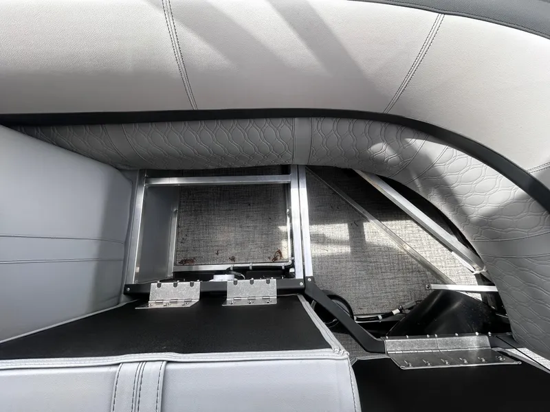 Slide: The Image of Interior seating of 2025 Avalon LSZ VRB23T DX with gray upholstery and metal frame. - 13