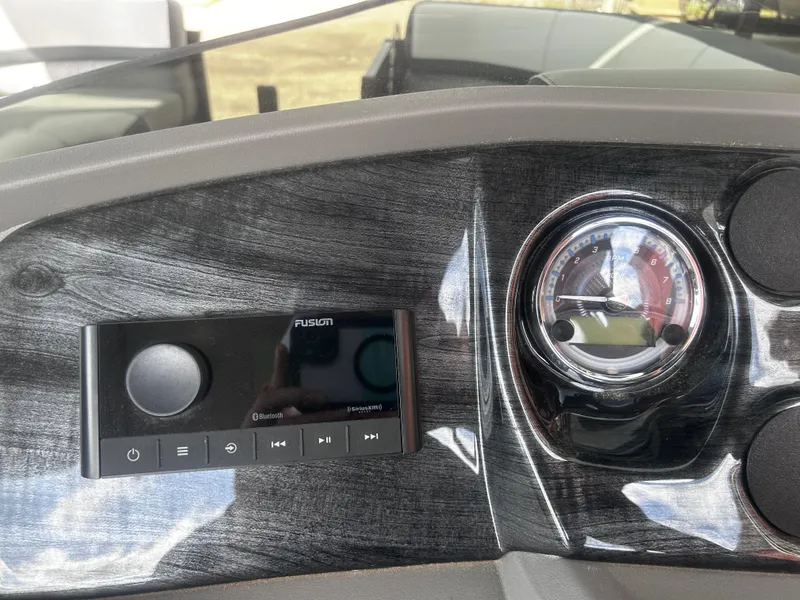 Slide: The Image of 2025 Avalon LSZ VRB23T DX dashboard with Fusion audio system and RPM gauge. - 17