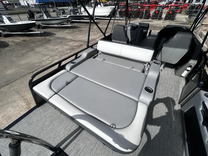 Slide: The Image of 2025 Avalon LSZ VRB23T DX pontoon boat with spacious seating and modern design. - 24