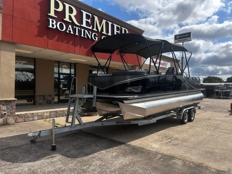 Slide: The Image of 2025 Avalon LSZ VRB23T DX pontoon boat on trailer at Premier Boating Center. - 3