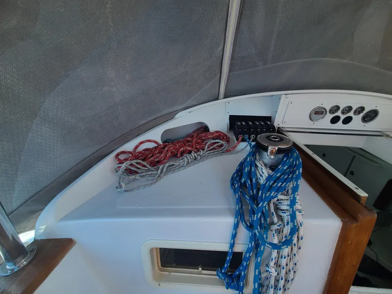 Slide: The Image of Interior of 1981 Kelly Peterson 44 sailboat with ropes and control panel. - 37