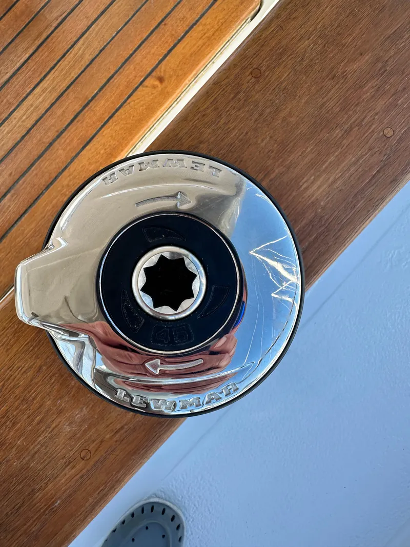 Slide: The Image of Chrome winch on 1981 Kelly Peterson 44 sailboat deck. - 38