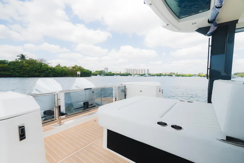 Slide: The Image of 2024 Saxdor 400 GTO yacht with spacious deck and scenic water view. - 16