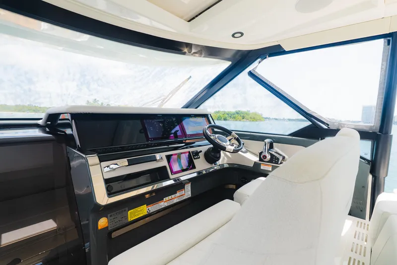 Slide: The Image of 2024 Saxdor 400 GTO helm with modern controls and panoramic windows. - 23