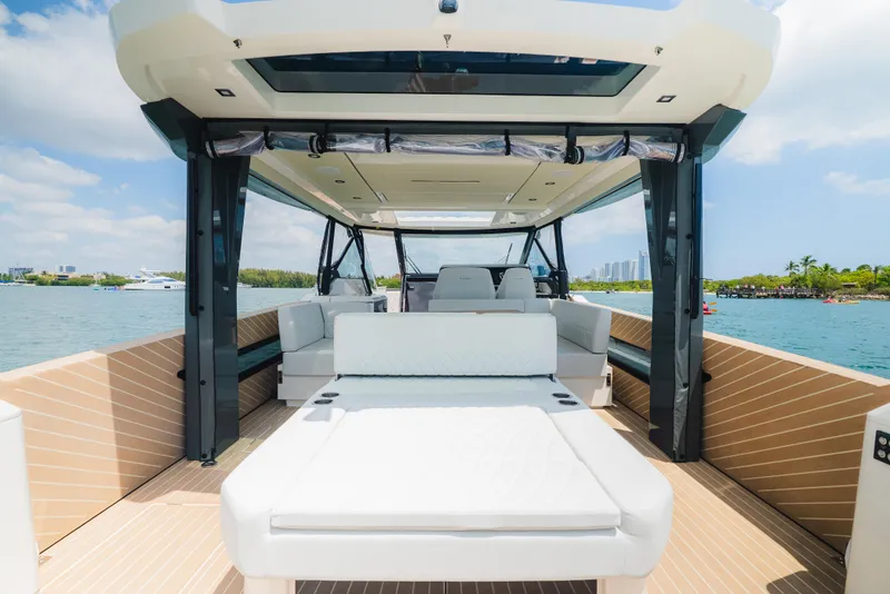 Slide: The Image of 2024 Saxdor 400 GTO luxury yacht interior with spacious seating and scenic ocean view. - 26