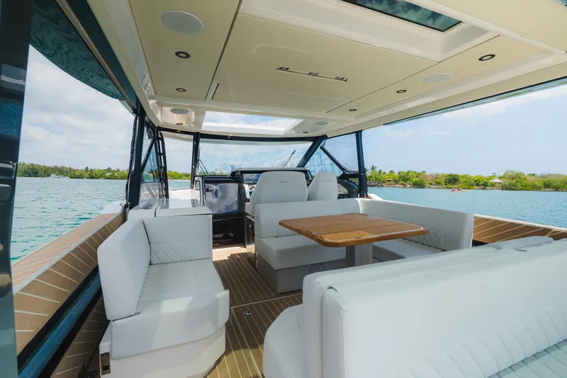 Slide: The Image of Luxurious interior of 2024 Saxdor 400 GTO yacht with elegant seating and wooden table. - 27