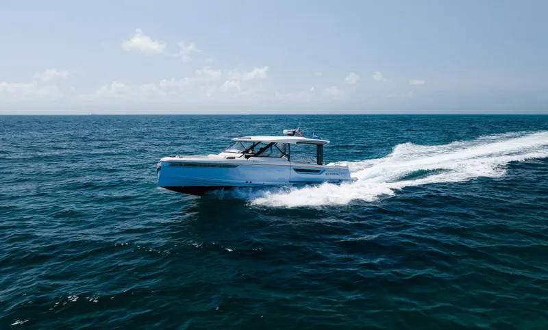 Slide: The Image of 2024 Saxdor 400 GTO cruising on open sea under clear sky. - 39
