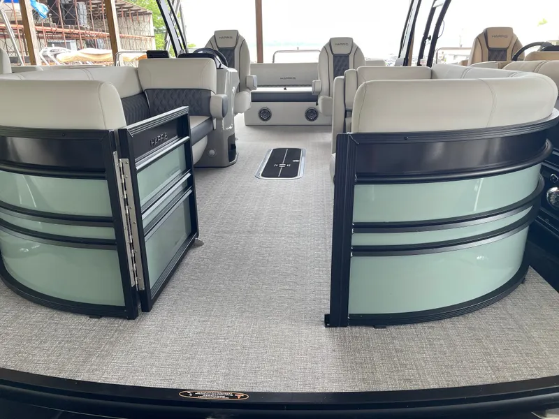Slide: The Image of 2025 Harris SUNLINER 230 SLDH pontoon boat interior with luxurious seating and modern design. - 3