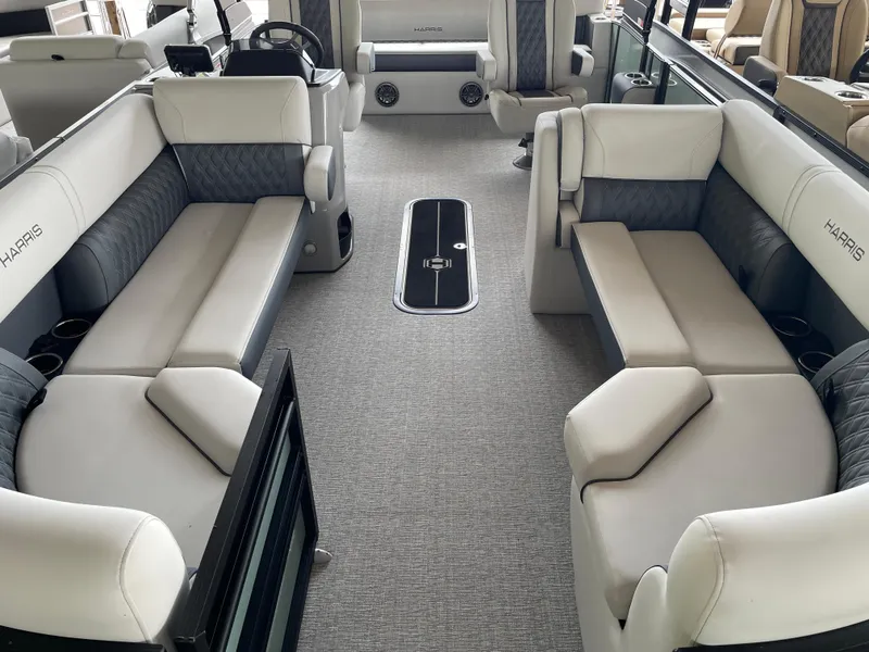 Slide: The Image of Luxurious interior of 2025 Harris SUNLINER 230 SLDH pontoon boat with plush seating. - 4