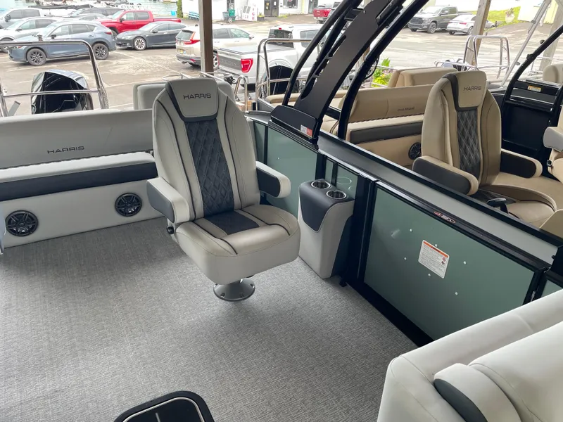 Slide: The Image of Interior of 2025 Harris SUNLINER 230 SLDH pontoon boat with luxurious seating and modern design. - 5