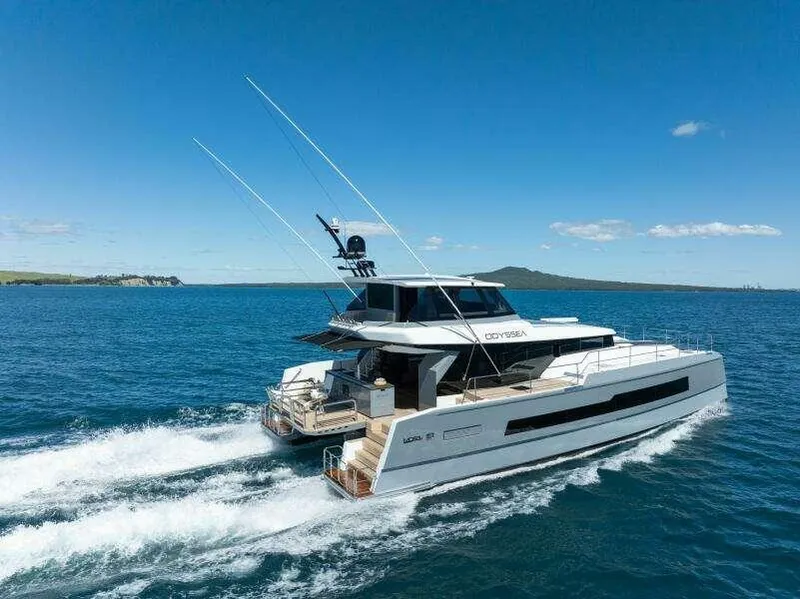 Slide: The Image of 2026 McConaghy MC63P yacht cruising on open water under clear blue skies. - 12