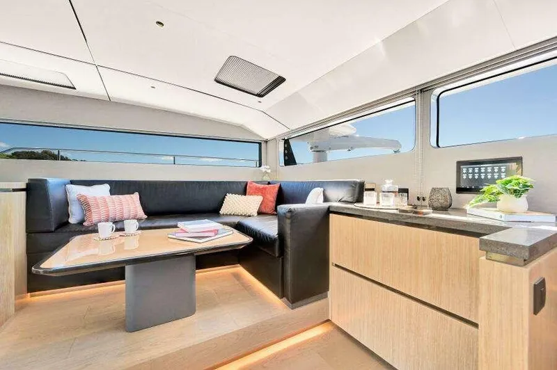Slide: The Image of Luxurious interior of 2026 McConaghy MC63P yacht with modern seating and elegant decor. - 29