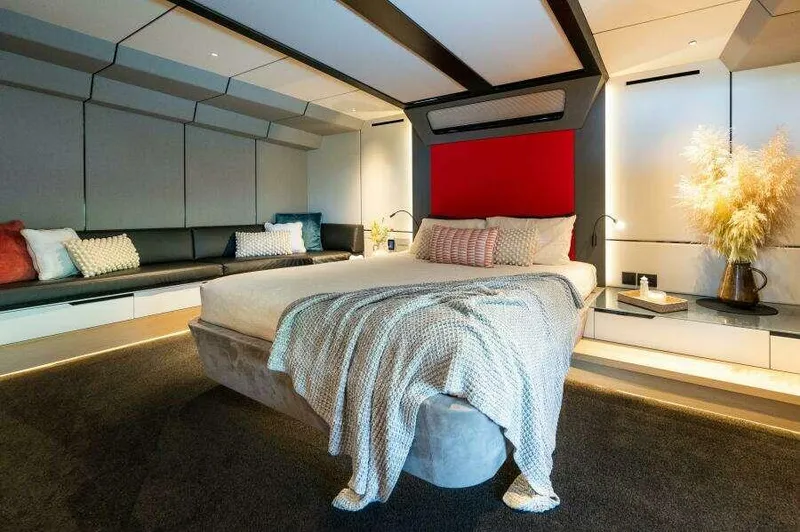 Slide: The Image of Luxurious McConaghy MC63P 2026 yacht bedroom with modern decor and cozy bedding. - 31