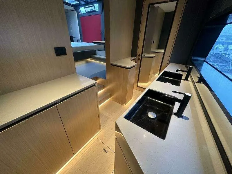 Slide: The Image of Luxurious interior of 2026 McConaghy MC63P yacht with modern fixtures and sleek design. - 36