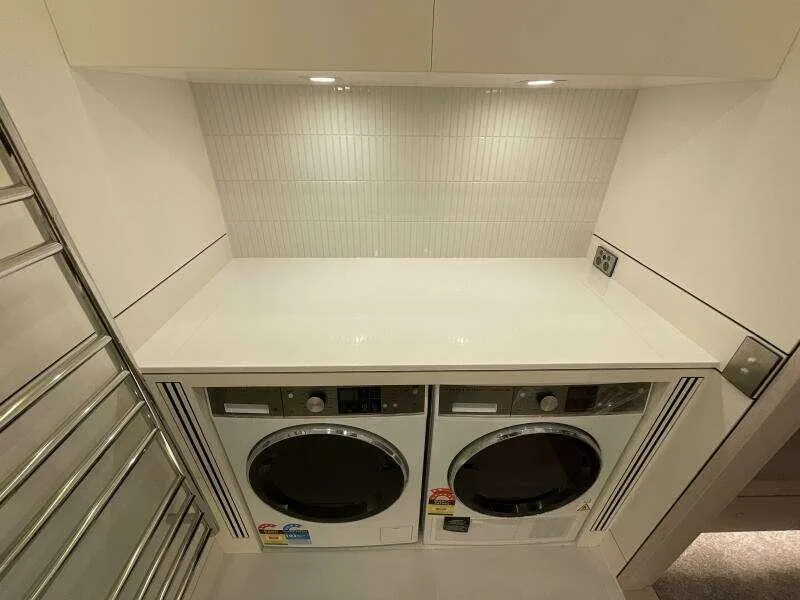 Slide: The Image of Modern laundry area with washer and dryer, McConaghy MC63P 2026 model. - 40