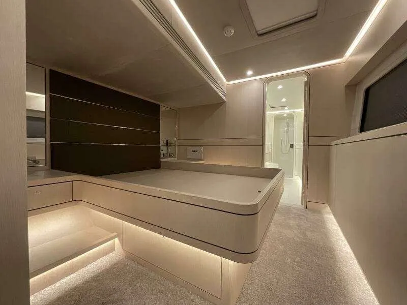 Slide: The Image of Luxurious interior of 2026 McConaghy MC63P yacht with modern lighting and sleek design. - 41
