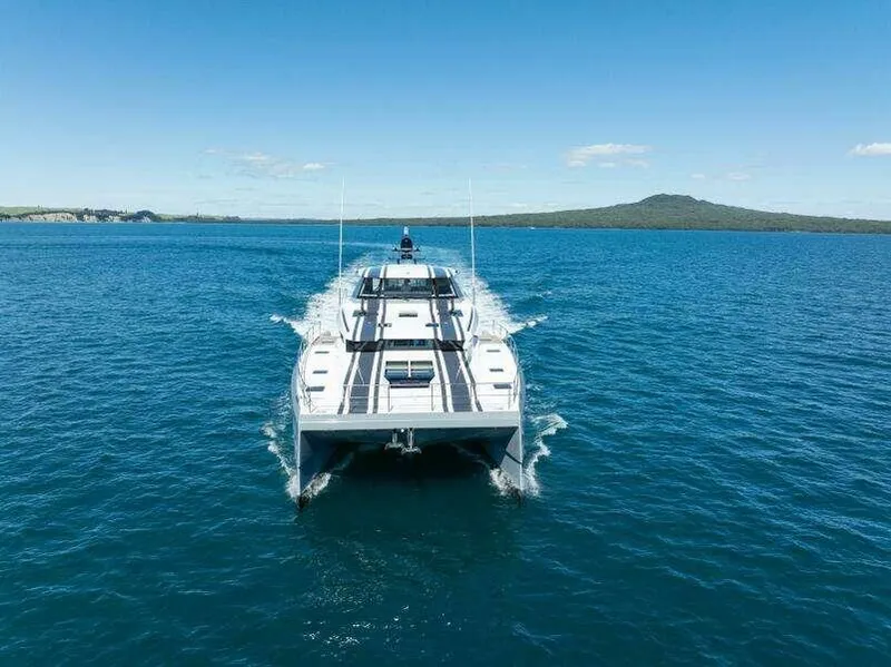 Slide: The Image of 2026 McConaghy MC63P yacht cruising on open blue water under clear skies. - 9