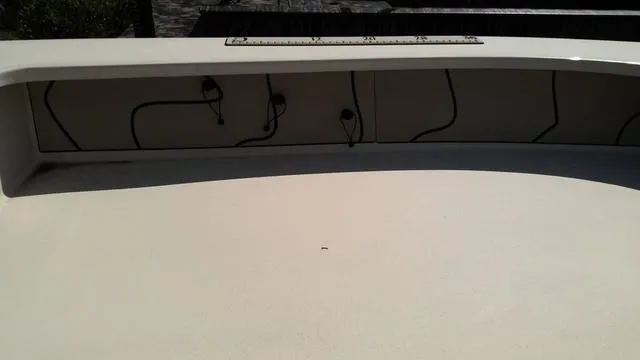 Slide: The Image of 2025 Xplor D18 Guide Tiller boat interior with wiring and measurement markings. - 3