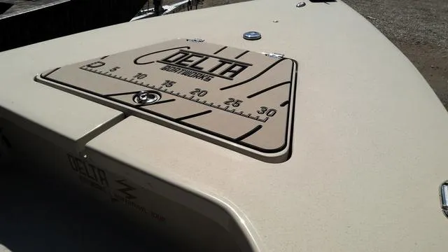 Slide: The Image of 2025 Xplor D18 Guide boat with Delta Deckworks ruler on deck. - 4