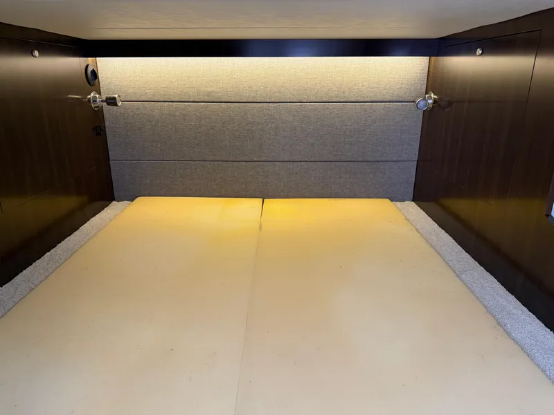 Slide: The Image of Interior cabin of 2021 Cruisers Yachts 38 GLS OB, featuring modern lighting and sleek design. - 17