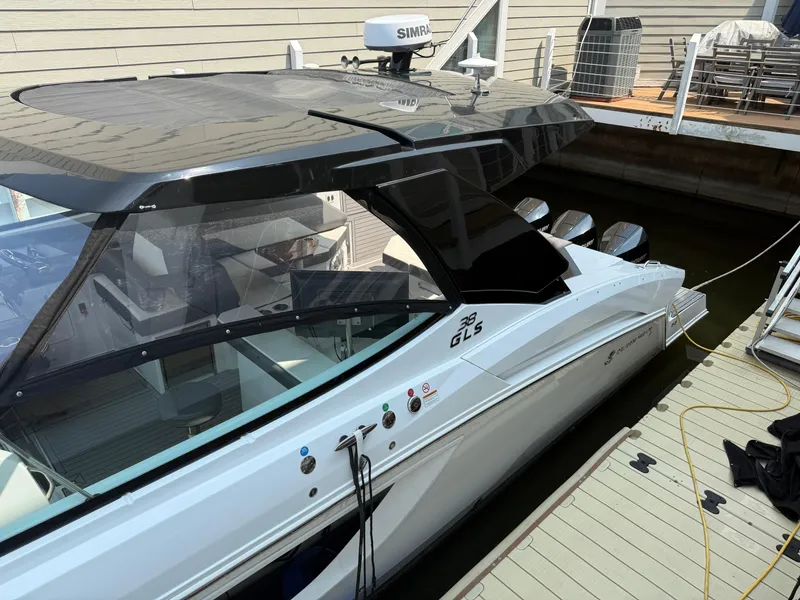 Slide: The Image of 2021 Cruisers Yachts 38 GLS OB docked, showcasing sleek design and modern features. - 23