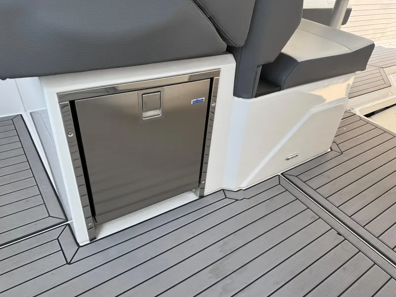 Slide: The Image of 2021 Cruisers Yachts 38 GLS OB interior with stainless steel storage on sleek deck. - 34