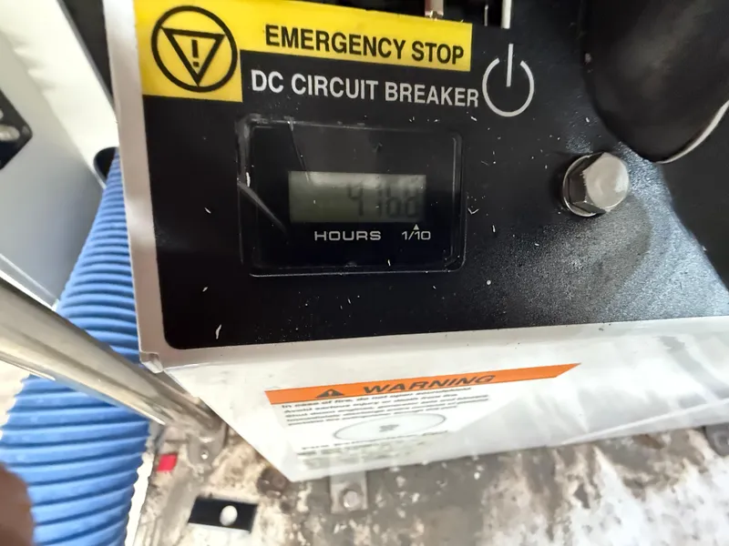 Slide: The Image of Emergency stop and DC circuit breaker panel on 2021 Cruisers Yachts 38 GLS OB. - 35