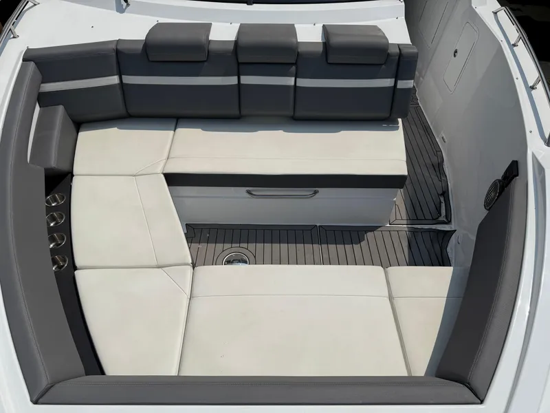Slide: The Image of 2021 Cruisers Yachts 38 GLS OB interior seating with gray and white upholstery. - 9