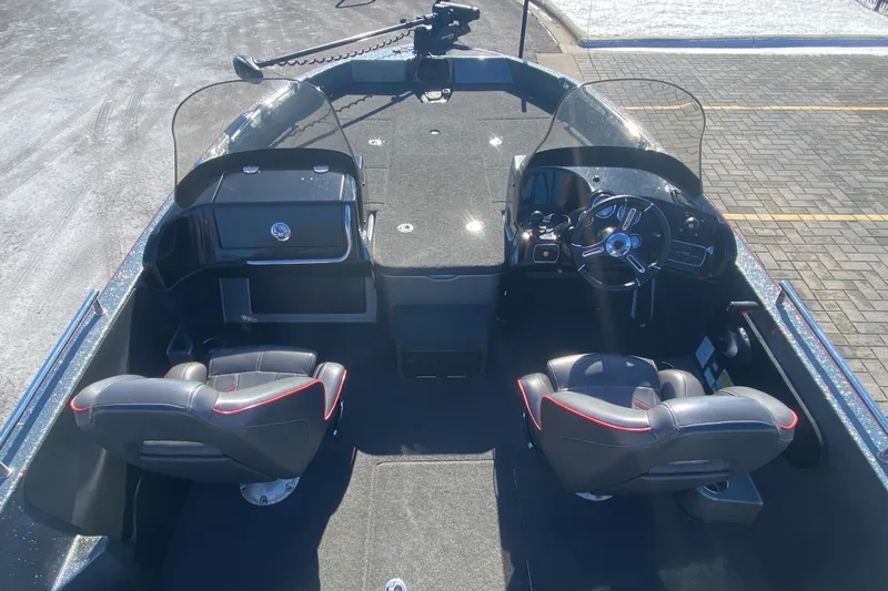 Slide: The Image of 2018 Nitro ZV 18 boat interior with dual seats and steering console. - 4