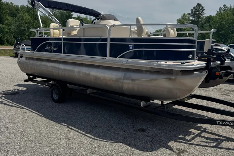 Slide: The Image of 2014 SunChaser Classic Cruise 8520 pontoon boat on trailer, parked outdoors. - 0