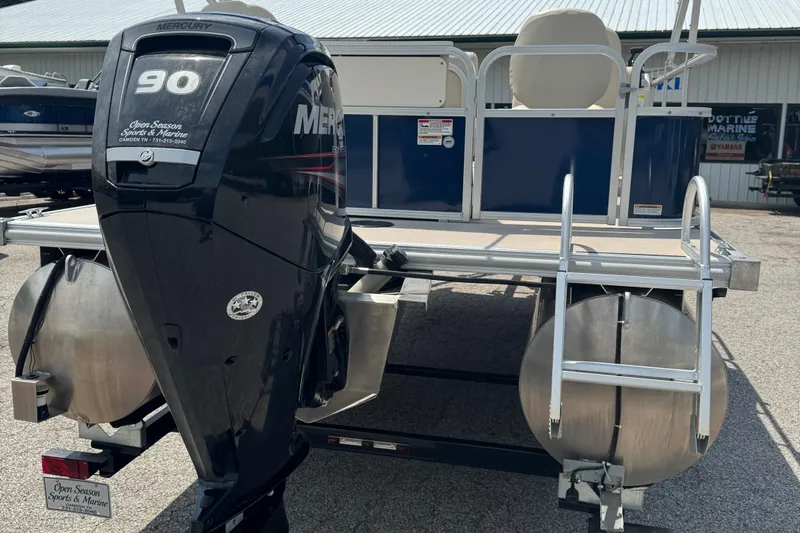 Slide: The Image of 2014 SunChaser Classic Cruise 8520 pontoon boat with Mercury 90 engine, rear view. - 3