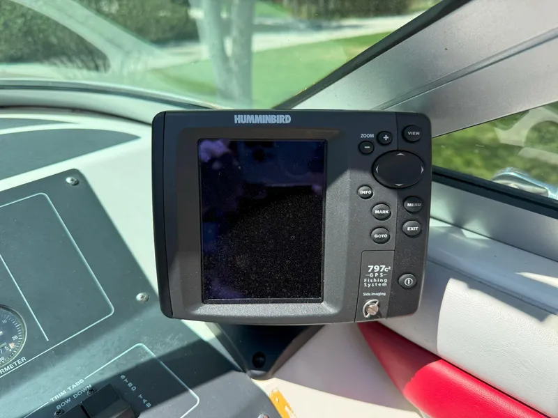 Slide: The Image of Humminbird fish finder on 1988 Slickcraft 268 SC boat dashboard. - 23