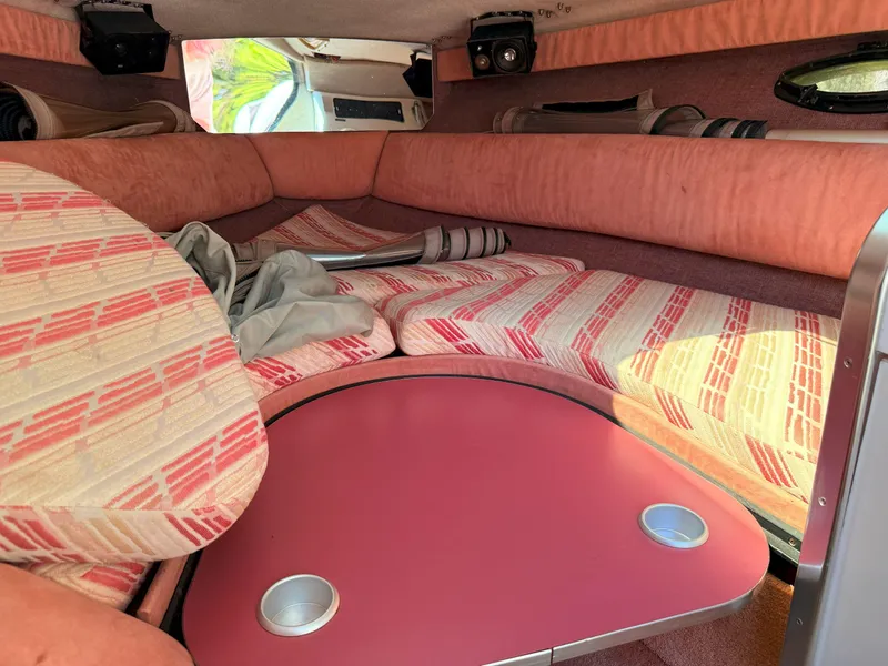 Slide: The Image of Interior cabin of 1988 Slickcraft 268 SC boat with pink and striped upholstery. - 35