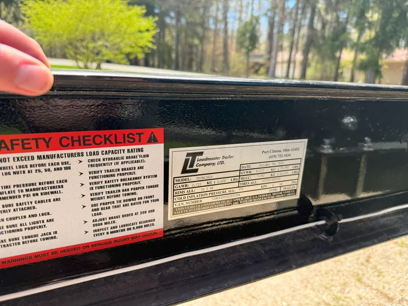 Slide: The Image of Safety checklist and label on a 1988 Slickcraft 268 SC trailer. - 46