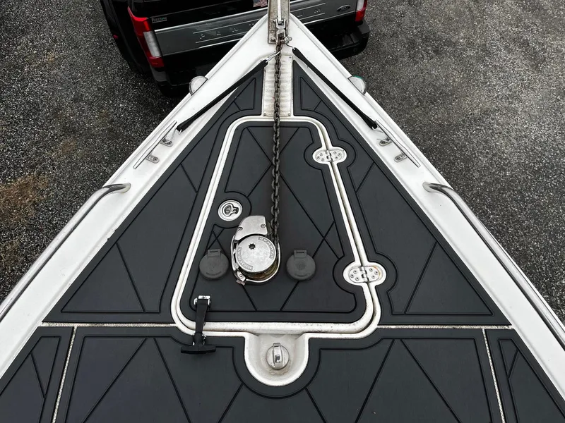 Slide: The Image of Bow of 2011 Fountain 38 CC Tournament Edition boat with anchor chain and deck details. - 4