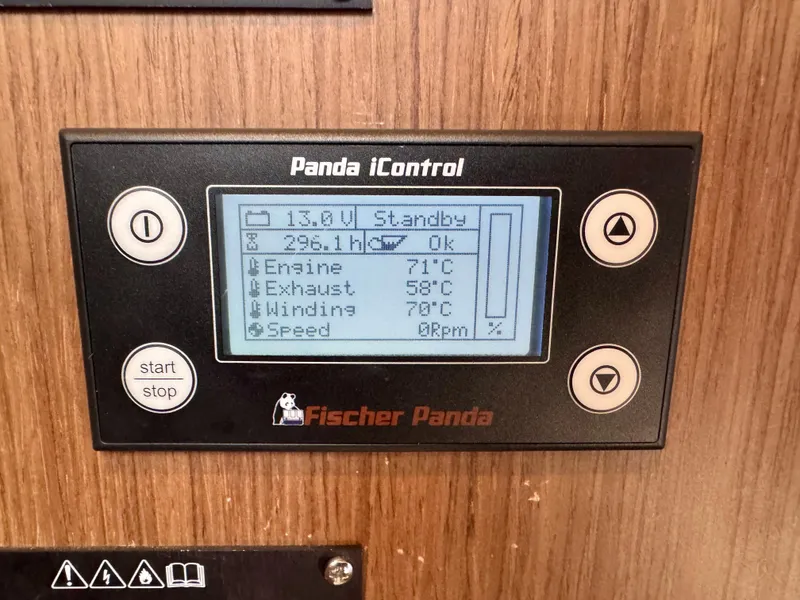 Slide: The Image of Fischer Panda iControl display on 2024 Beneteau Antares 11, showing engine and exhaust temperatures. - 29
