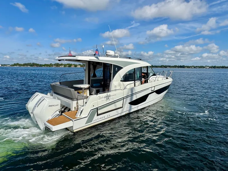 Slide: The Image of 2024 Beneteau Antares 11 cruising on a sunny day with clear skies. - 5