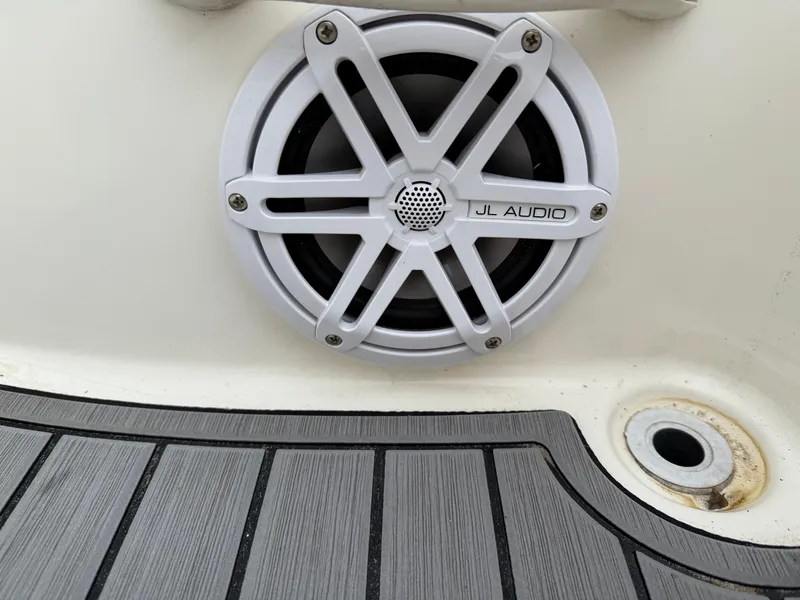 Slide: The Image of JL Audio speaker on 2007 Zodiac Yachtline 380DL boat deck. - 13
