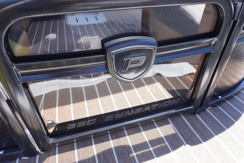 Slide: The Image of 2025 Premier 250 Sunsation RS boat deck with logo and stylish flooring. - 11