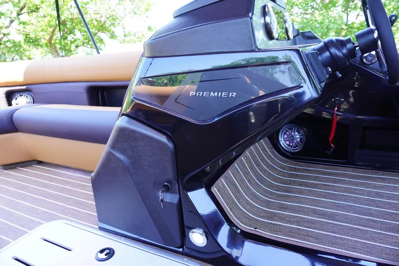 Slide: The Image of 2025 Premier 250 Sunsation RS boat interior with sleek dashboard and luxurious seating. - 14